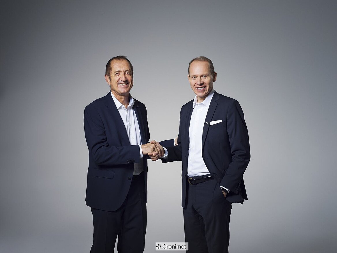 Jürgen Pilarsky, CEO Cronimet Holding Group (left) and Heikki Malinen, CEO of Outokumpu (right).