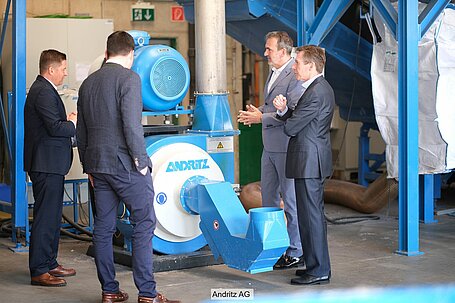 Managers of ARA and Andritz view shredder plant