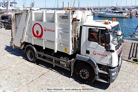 Veolia waste collection vehicle in a port on the Baltic Sea