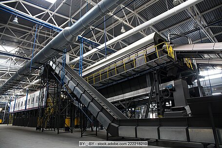 Conveyors in a sorting facility
