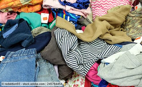 Pile of mixed used clothing, stockphoto waste textiles