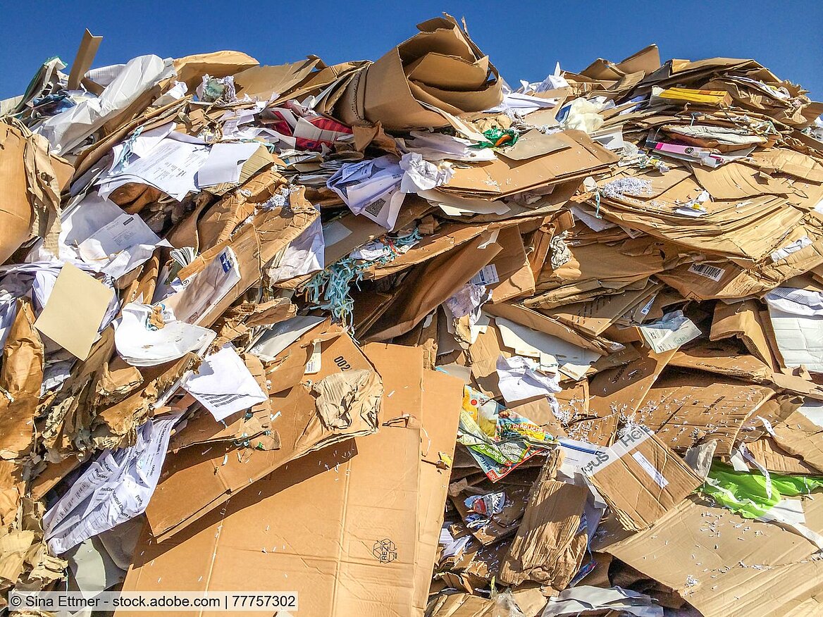 Heap of loose recovered paper and board