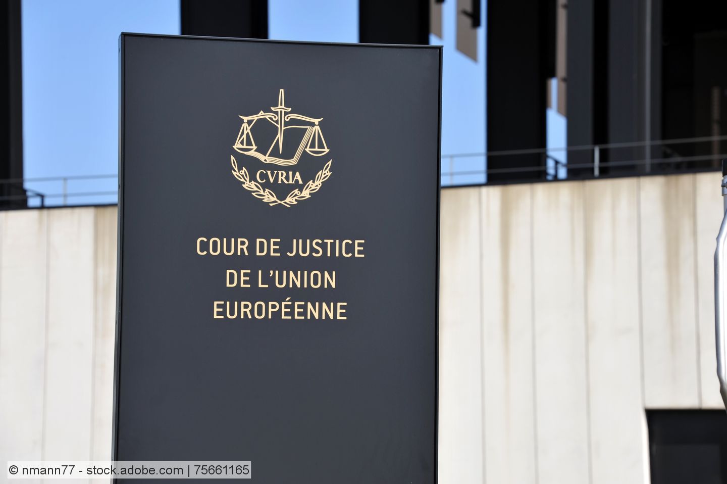 stock photo of sign infront of the European Court of Justice building in Luxembourg City, Luxembourg