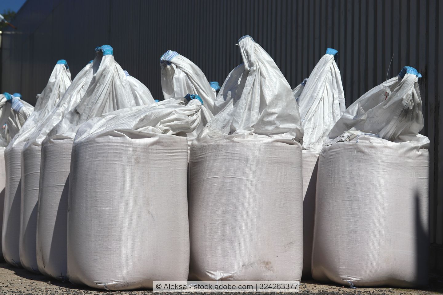 Big-Bags with chemcial fertiliser stand in a row.