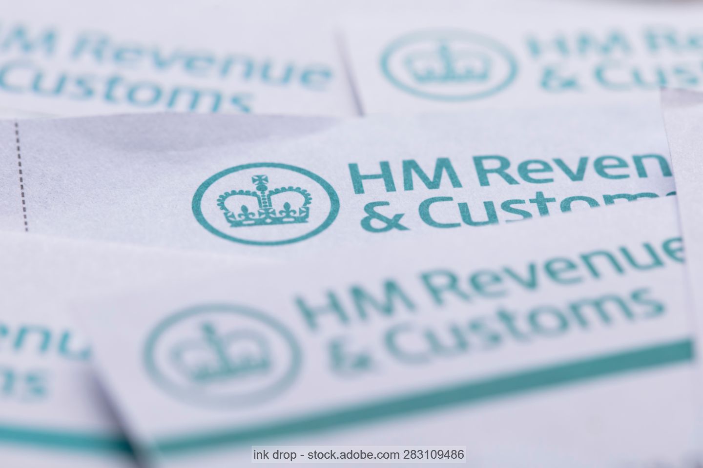 Photo of documents with the letterhead of HM Revenue & Customs (HMRC), the UK's tax authority. 