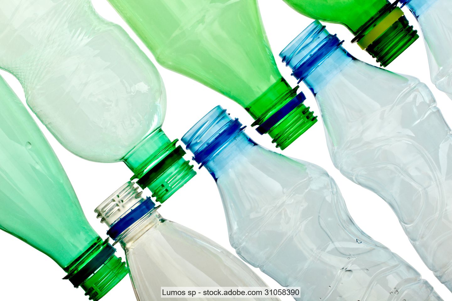 capless clear, blue and green PET bottles lined up neck to neck